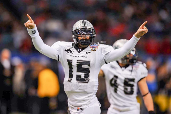 As a junior, Brennan set a single-season record with 58 passing TDs. As a senior, he took Hawaii to the Sugar Bowl, against Georgia.